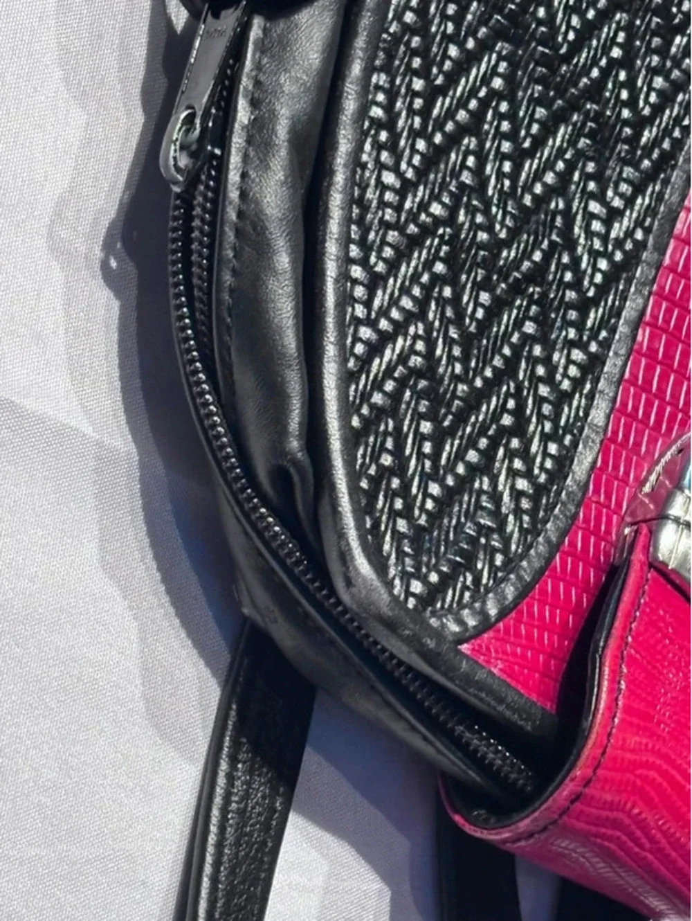 A Vintage Roche Leather 2002 Fuchsia & Black Textured Backpack